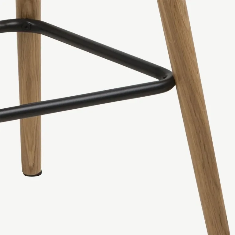 Grace baaritool tumehall kangast polsterduse ja tammepuidust jalgadega. Elegantne ja ergonomiline disain koos käetugedega tagab mugava istumise. Sobib ideaalselt köögisaare või baarileti juurde.