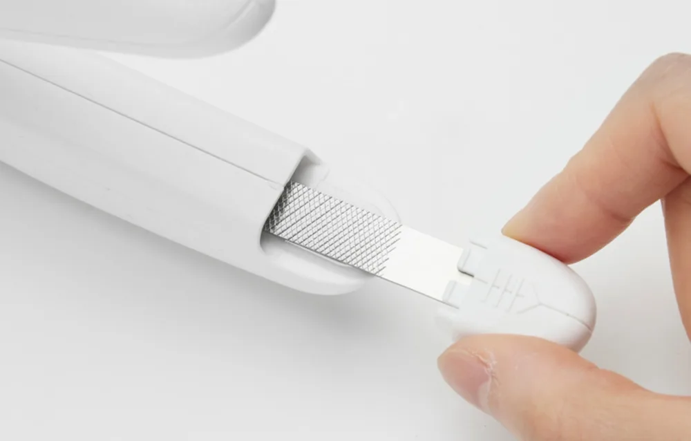 Petkit PRO lemmiklooma küünetangid ergonoomilise käepidemega kasutamisel