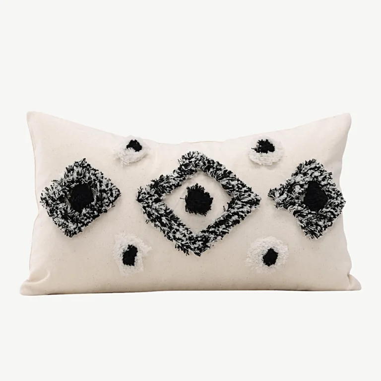 Must-valge tuftitud dekoratiivse padjakatte Melissa, 30×50 cm - 17047-500