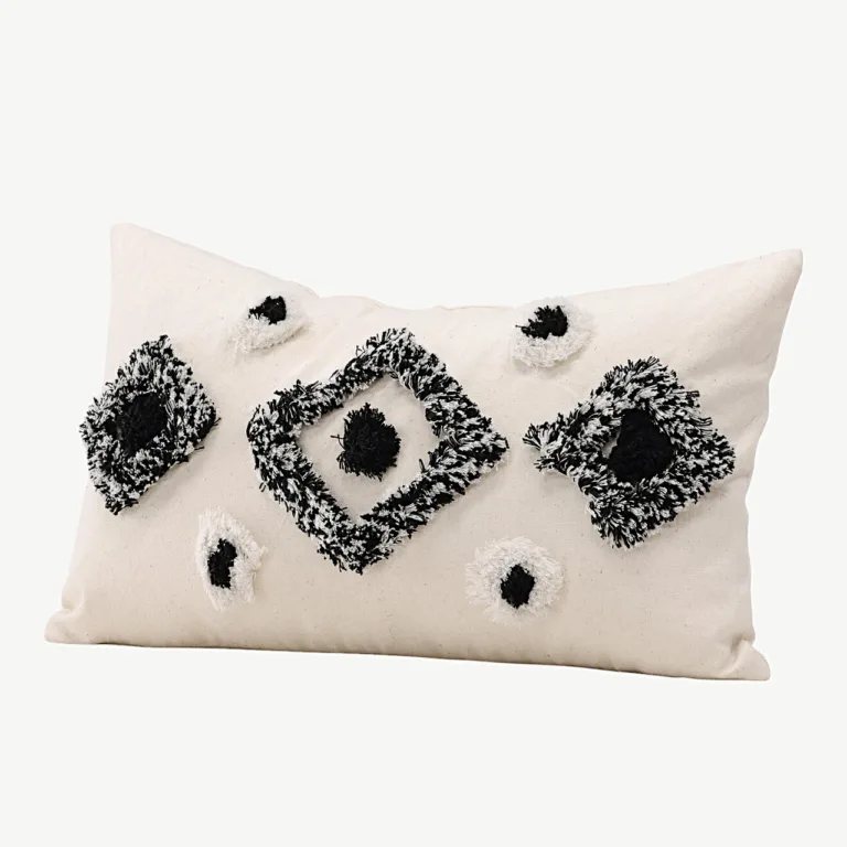 Must-valge tuftitud dekoratiivse padjakatte Melissa, 30×50 cm - 17047-500