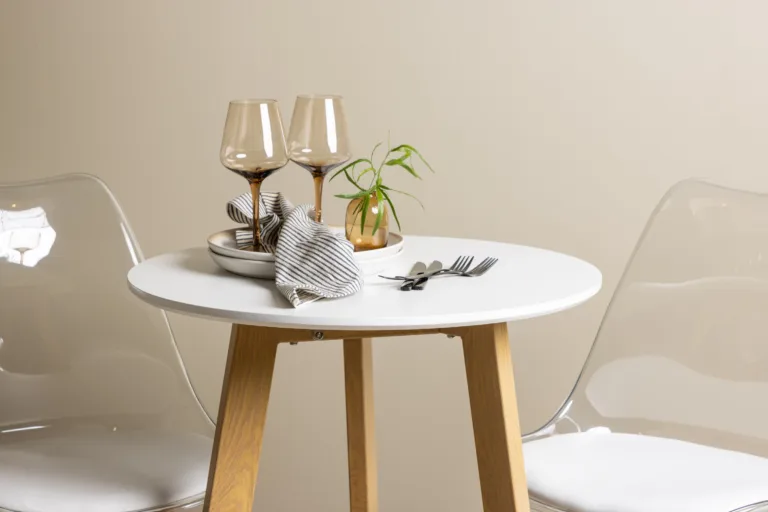 Ümmargune söögilaud Leonora koos läbipaistva Edvin tooliga (valge MDF, tammepuidutoon, ø65cm) - GR23504