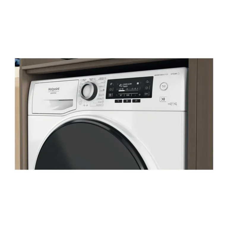 Hotpoint valge pesumasin-kuivati köögis integreeritud lahendusega