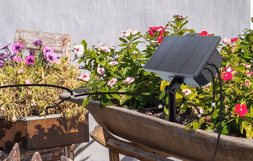 RainPointi solaarne tilkniisutuskomplekt puidust potis värviliste lilledega