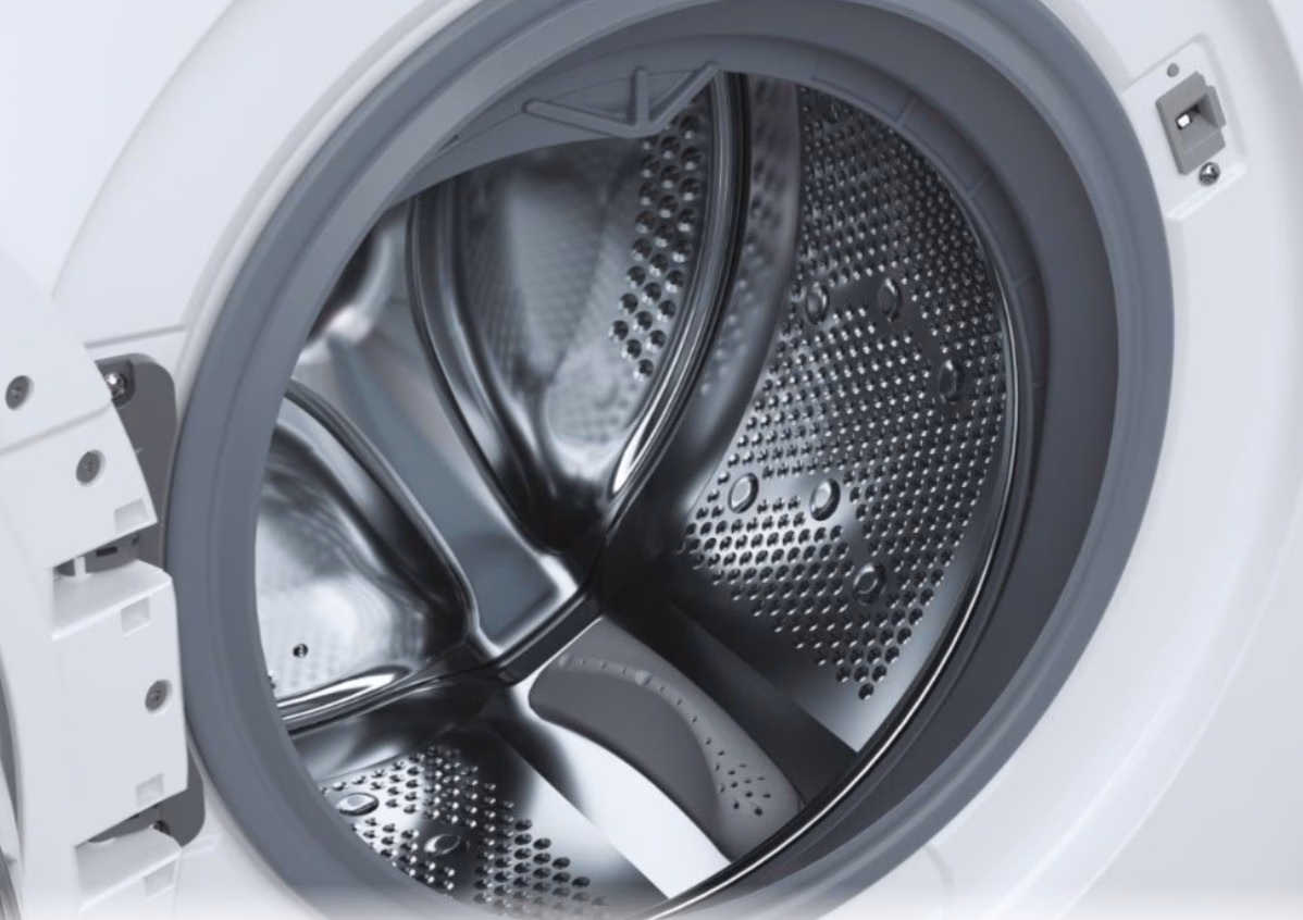 Candy CS1482DW4/1-S roostevabast terasest trummel avatud ukse tagant