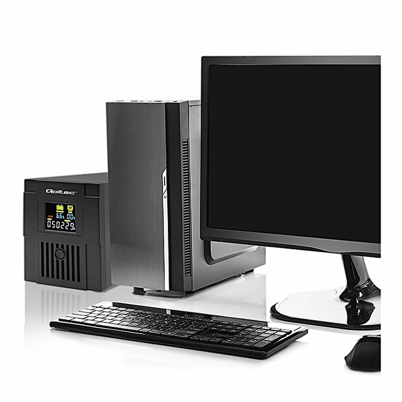 UPS Qoltec Monolith 53770 lauaarvuti ja monitori kõrval