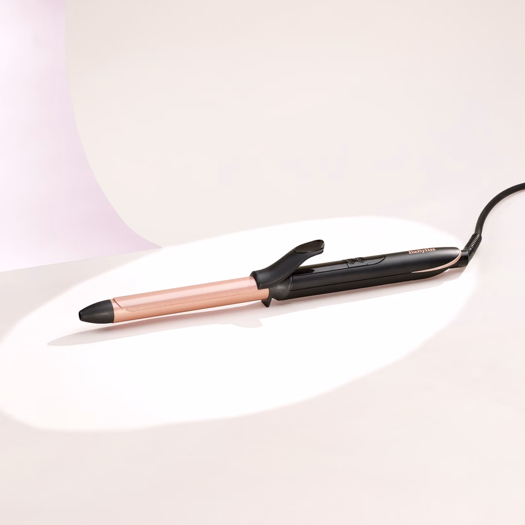 Juuksekoolutaja BaByliss C450E valgel alusel koos toitejuhtmega