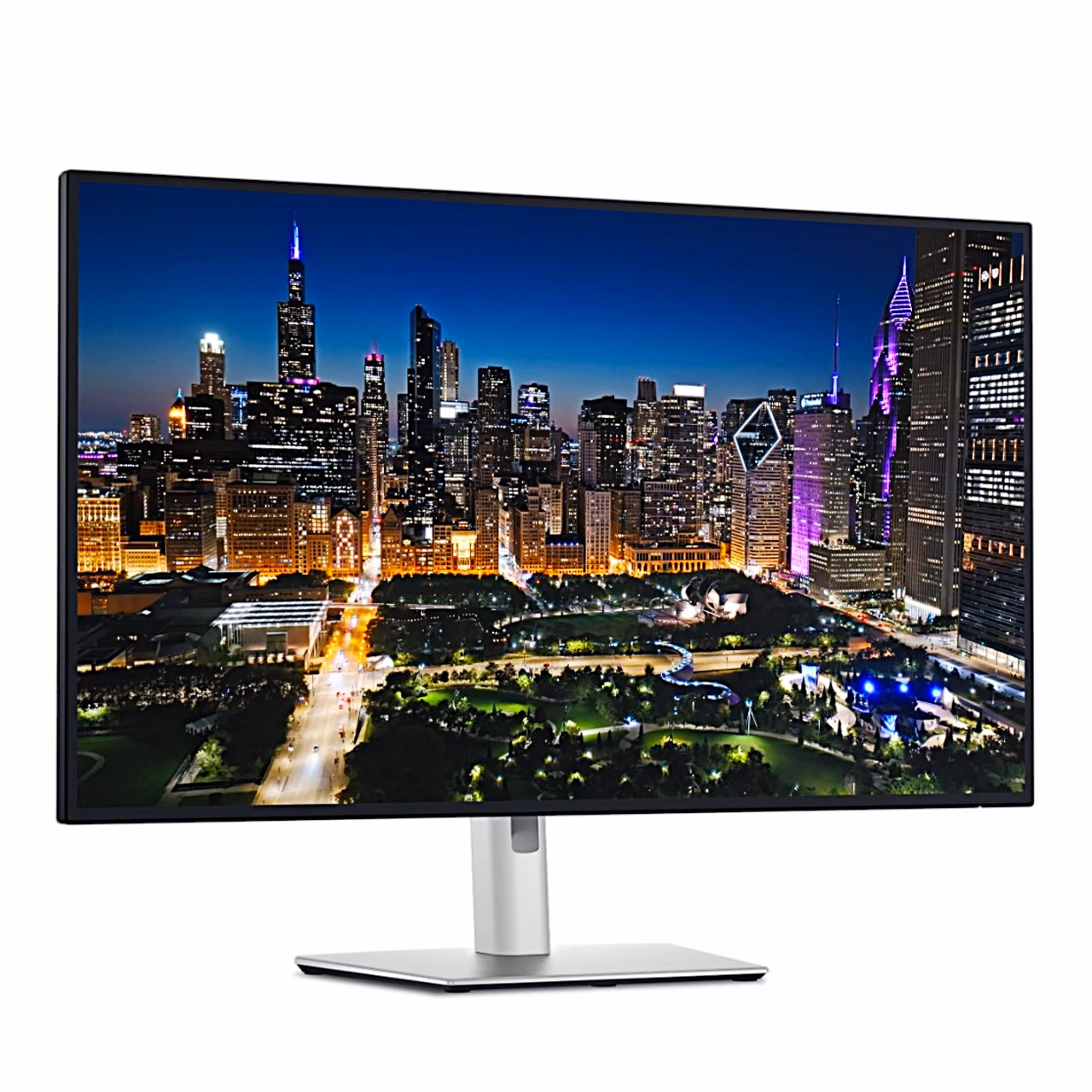Arvutimonitor Dell UltraSharp U3225QE vasakult eestvaates, ekraanil linnavaade