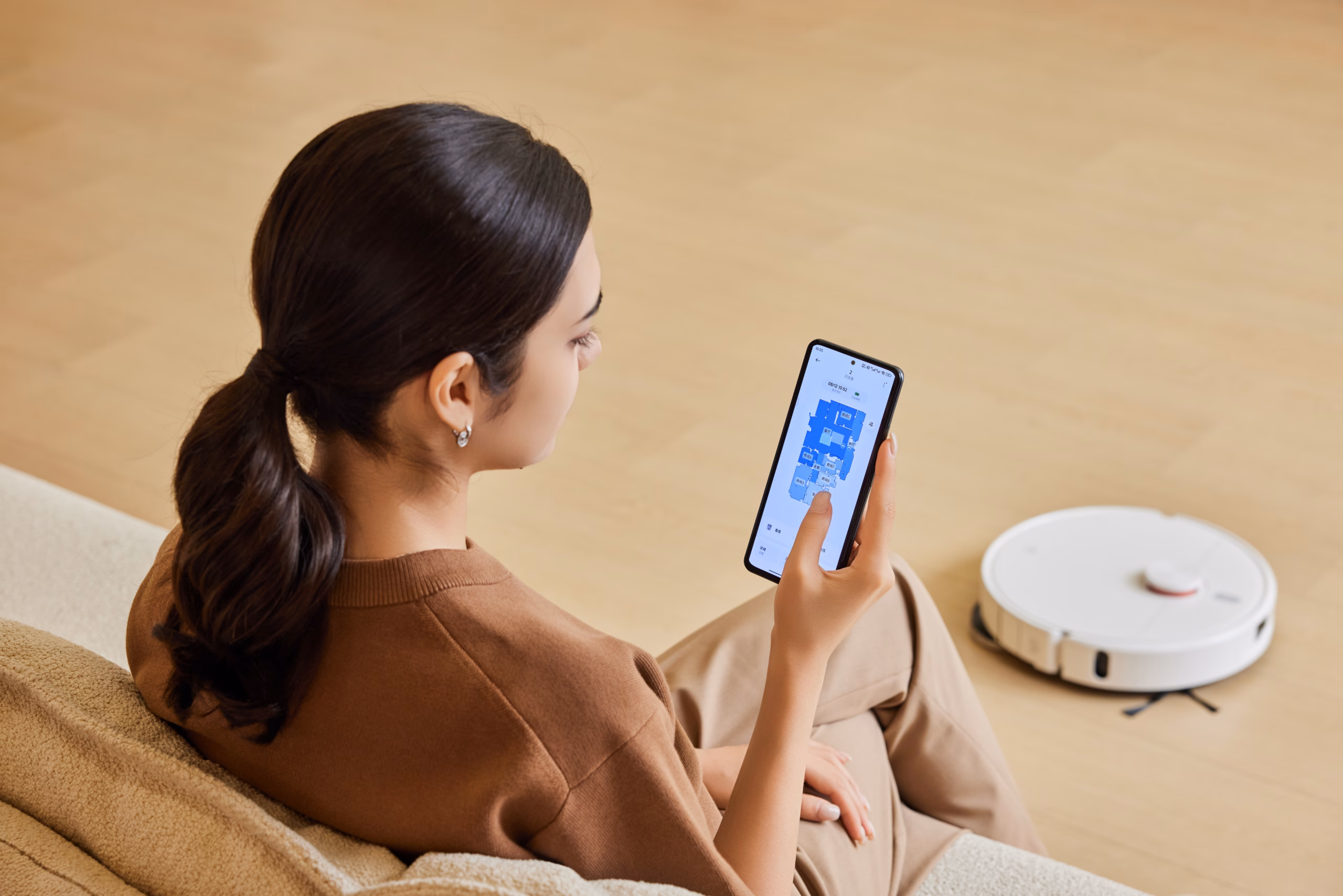 Robottolmuimeja mopiga Xiaomi H50 ja telefonis rakendus Xiaomi Home